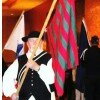 Robert Ridenour carries George Rogers Clark flag at symposium in East Peoria